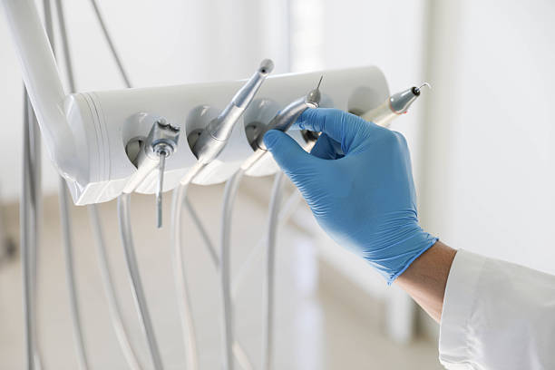 Professional Tooth Extraction technician working in Moores Mill, AL